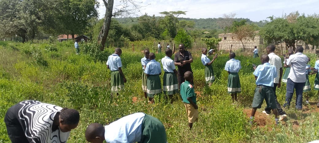 Muchukwo learners, Treemissions partner for reforestation at Lake Kamnarok, planting over 11000 trees