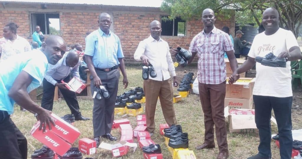 Church and Charity donate shoes to pupils in Kisumu to boost school attendance, dignity