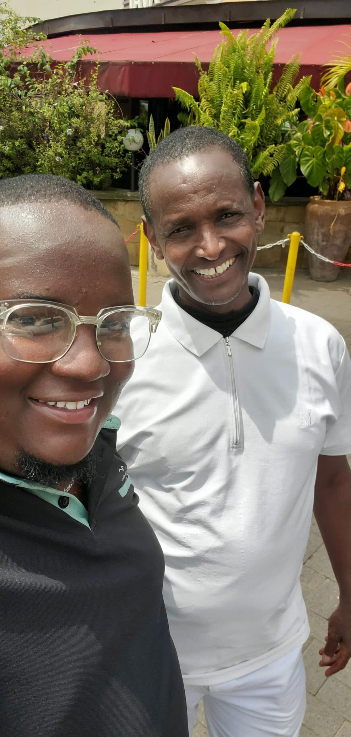 Former high school principal, Mario's Letelewa with former Solai High School student.