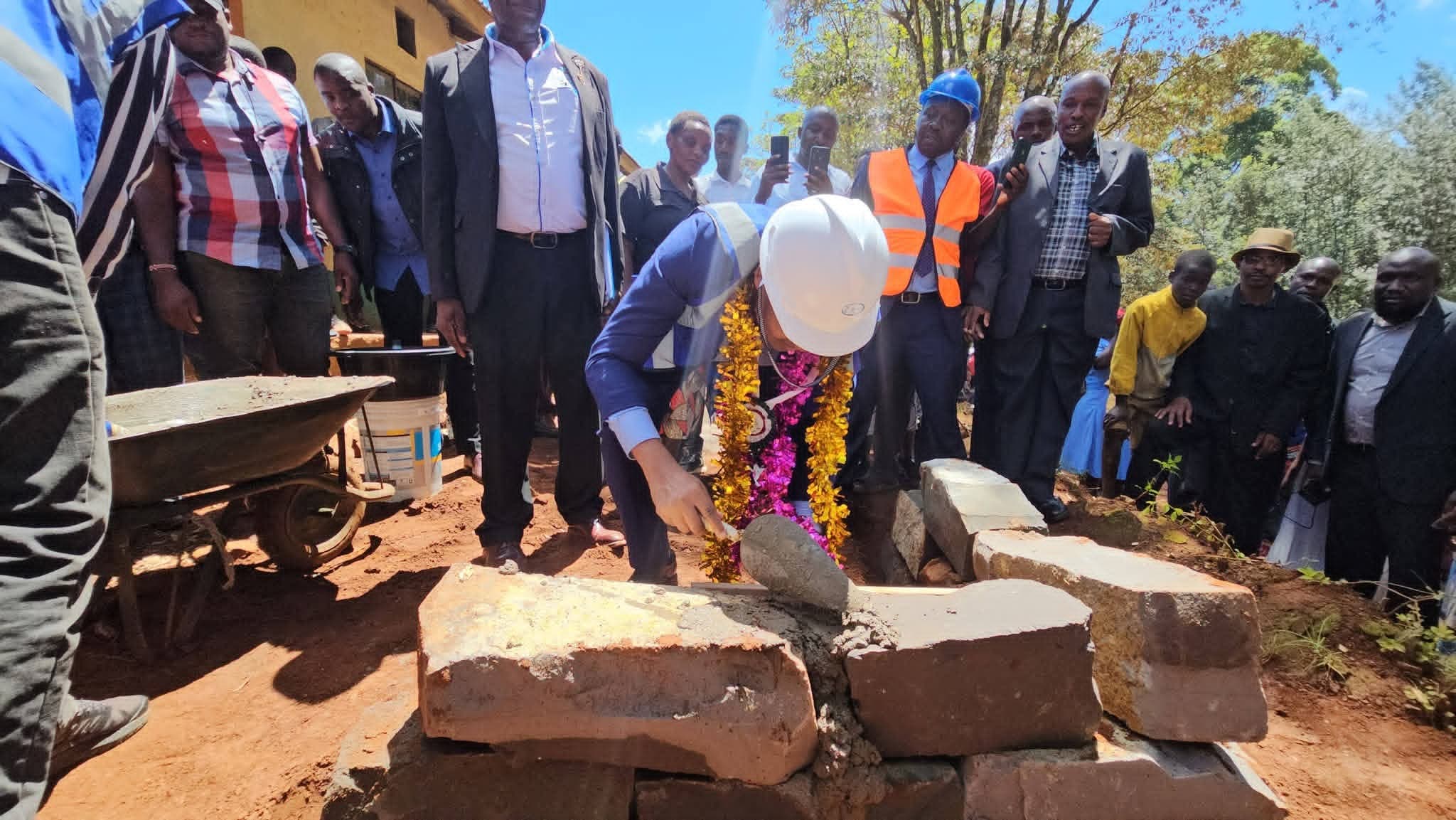 Bomachoge Borabu MP Obadiah Barongo laying foundation stone for Kemoreko PFA Comprehensive School Centre of Excellence. Photo: Enock Okong'o.