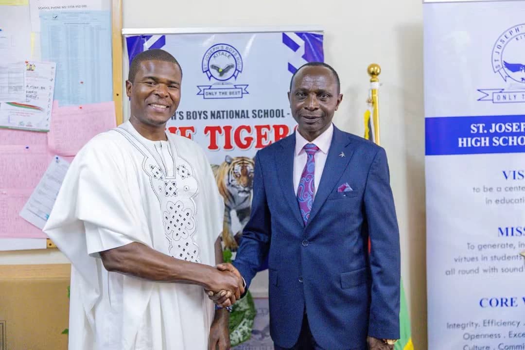 Former St. Anthony Boys top student returns to reunite with principal who mentored him