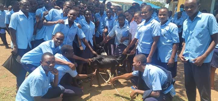 Principal gifts goats to candidates for upholding discipline