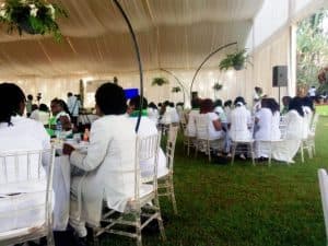 School alumni celebrate former principal in an all-white party image 1