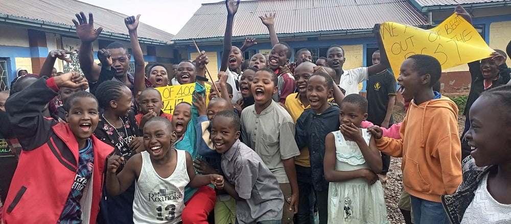 Pupils and teachers march to celebrate KCSE results. Little known Kerera Primary recorded the best results ever.