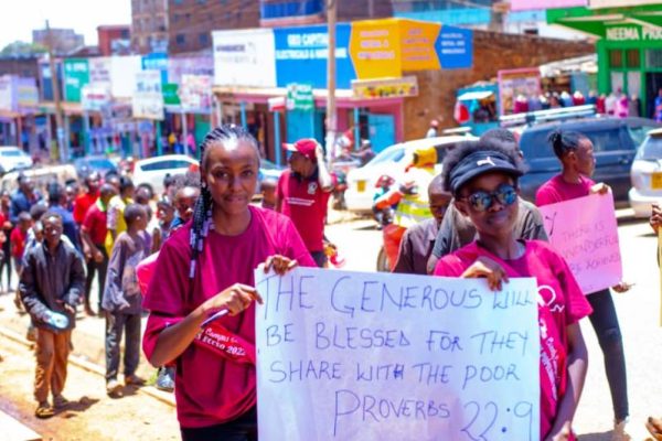 University students together with street children in Embu town