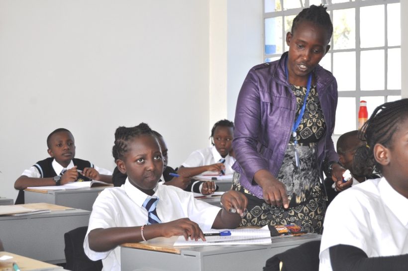 A teacher in a classroom session.
