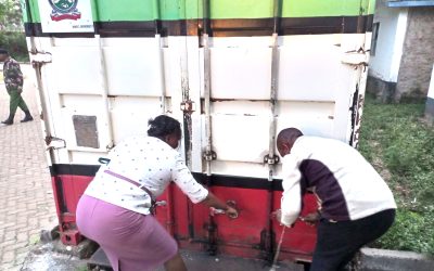 KNEC examiners examine the KCSE exam container