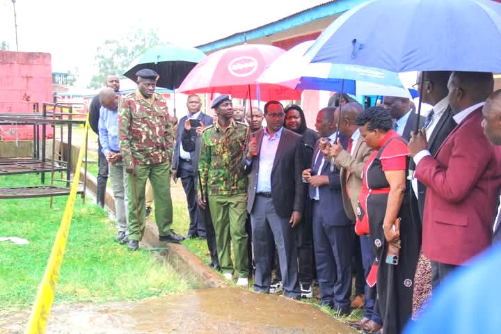 CS Julius Ogamba with County Security team at Cardinal Otunga during the recent fire incident