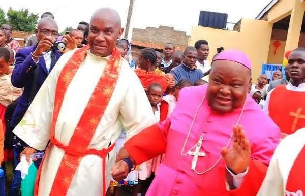 Students, teachers join Catholic bishop to celebrate his 70th birthday