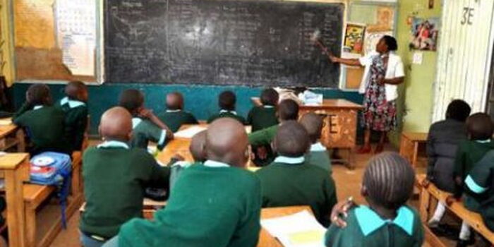 UNESCO: Kenya ahead of regional peers in school retention despite global education strains 3 pupils in class during study session