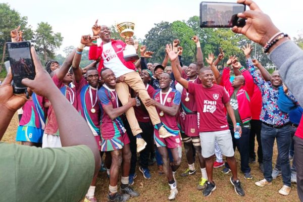 Kisii School Principal Fred Mogaka is carried shoulder high by his victorious rugby team