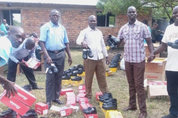 Church and Charity donate shoes to pupils in Kisumu to boost school attendance, dignity