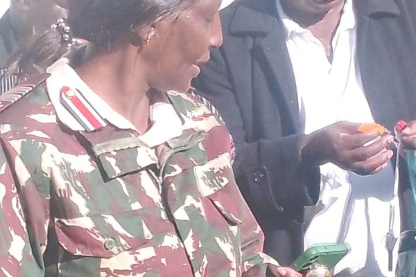 Gucha DCC Esther Kungu and Subcounty education director David Oyoko