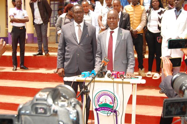 Kericho Township TVC Principal Mr. Shadrack Tonui with BOM Chair Dr. Reuben Langat