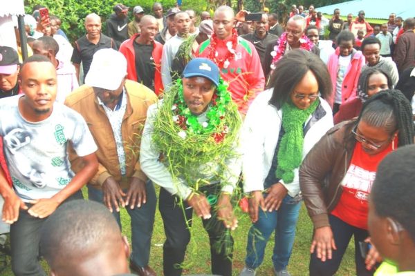 Lawyer Bernhard Ngetichcentre joins a dance at Kenegut Kapsoit Ward in Kericho county moments after urging for a united fight against doping in Kenyan sports