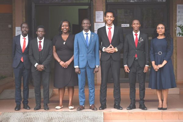 Newly elected CUEASO leaders pose for a group photo after their swearing in ceremony at Missio Hall in the CUEA