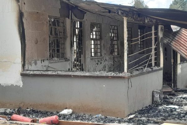 One of the dormitory structures burnt at Litein Boys High School as experts link rising student unrest to intense academic pressure from teachers and parents