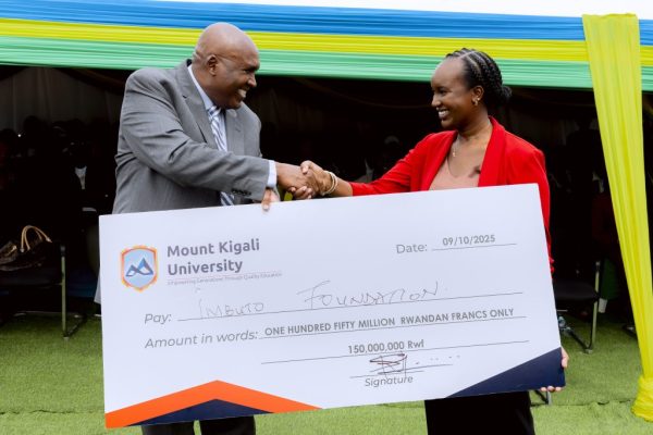 Prof Simon Gicharu while making his donation of Rwf150 million KSh 13.3 million to Imbuto Foundation for construction of new nursery schools in Gasabo District Rwanda