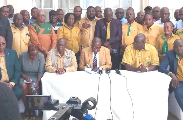 Mp Omboka Milemba with other top Kuppet officials during a presser in Nairobi