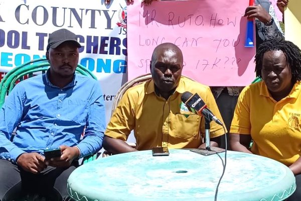 Narok KUPPET Branch Secretary Charles Ngenocentre and Treasurer Seela Kuluo right and JSS Intern chairman Abednego Singoe left during a press conference in Narok town