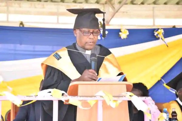 Saint John Paul II Institute Director Father Robert Mutui speaking during the function