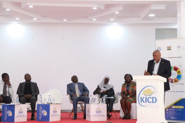 TSC Regional Director for Central Kenya Elijah Omwenga addressing stakeholders during Dissemination Forum for the VbE Pilot Report at KICD.Photo by Obegi Malack