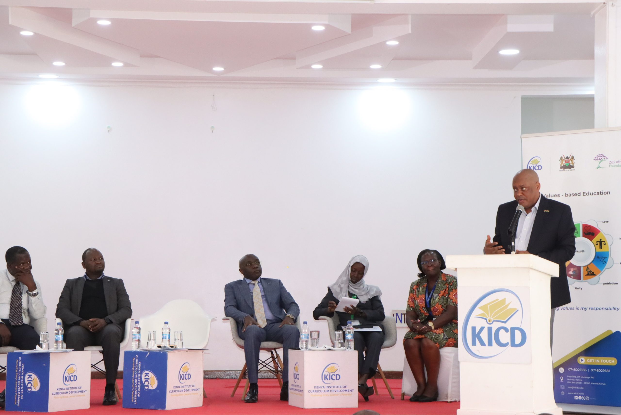 TSC Regional Director for Central Kenya Elijah Omwenga addressing stakeholders during Dissemination Forum for the VbE Pilot Report at KICD.Photo by Obegi Malack