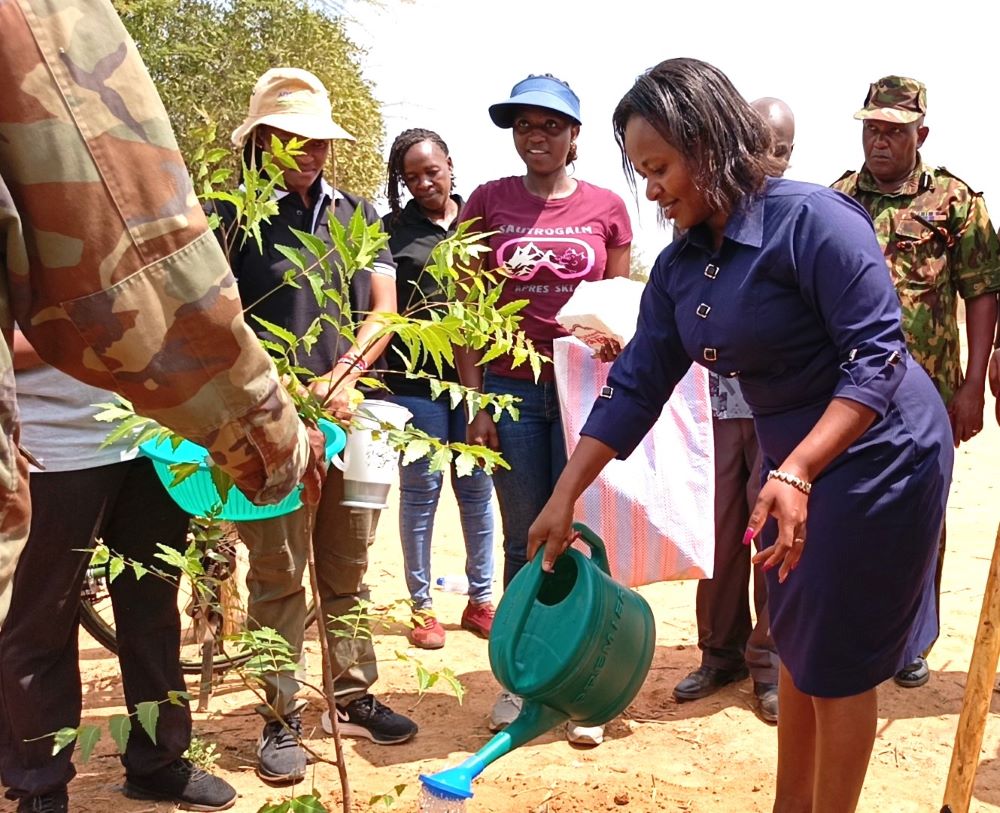 Kitui County, partners donate over 200 wheelchairs, pledge more support for disabled residents 2 Chief guest Phoebe Ndunyu Mutemi planting a commemorative tree during the function. Photographs by Boniface Mulu