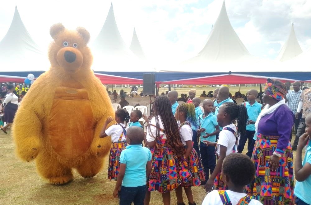 Governor Wavinya hosts early Christmas party for children in Machakos 1 Children amused by a Mascot outside the Machakos Governors office when Governor Wavinya hosted early Christmas party for children on December 16202 refined
