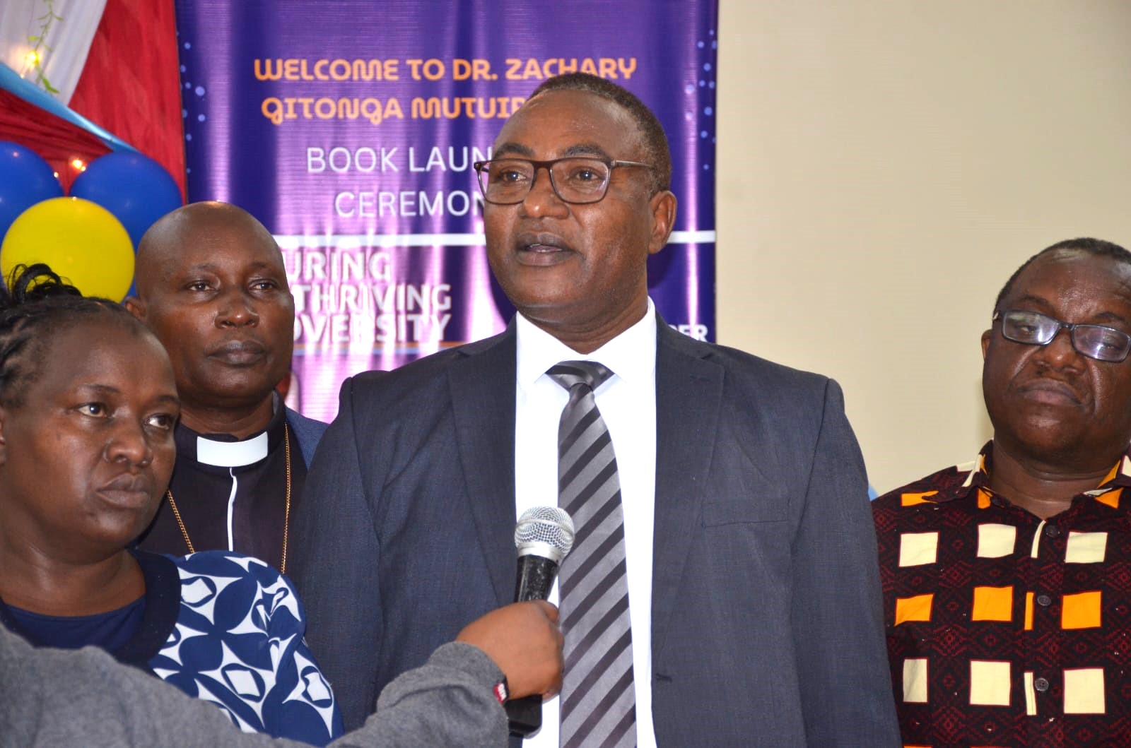 Retiring Education Director launches inspirational book on resilience 3 Dr Zachary Gitonga Mutuiri speaking during the book launch