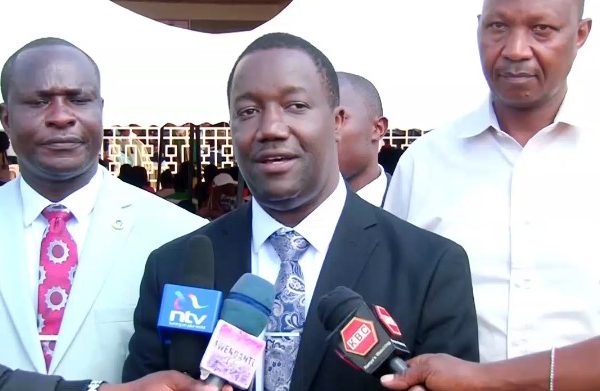 Dr. Fred Akama Founder LIAM foundation project addressing media during Young Entrepreneurs Business Summit held at Chuka university