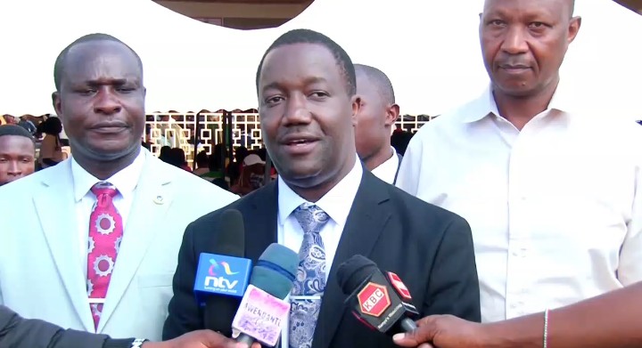 Dr. Fred Akama Founder LIAM foundation project addressing media during Young Entrepreneurs Business Summit held at Chuka university