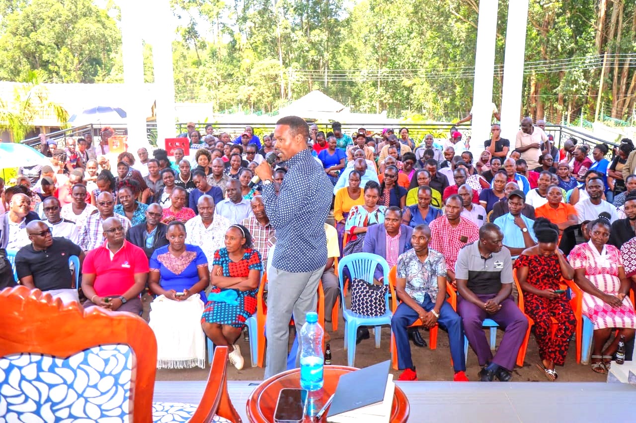 Kevin Arwasa engaging with teachers at his residence Photo Enock Okongo