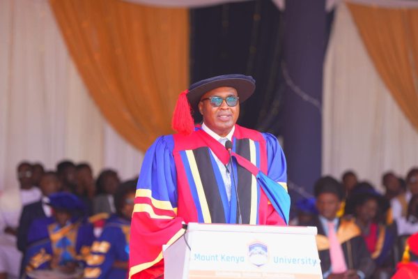 Mount Kenya University Founder and Chairman Prof Simon Gicharu speaking during the Universitys 28th graduation ceremony