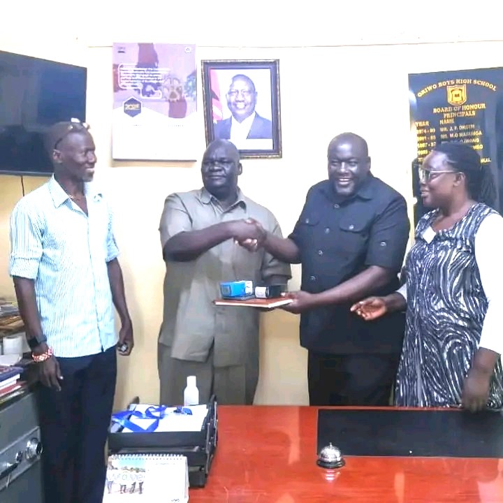 Veteran Mathematician Tom Amadi takes over as Principal of Oriwo Boys High School 2 Outgoing Oriwo Boys High School principal Henry Airo hands over office to incoming principal Tom Amadi during a leadership transition at the Homa Bay County institution