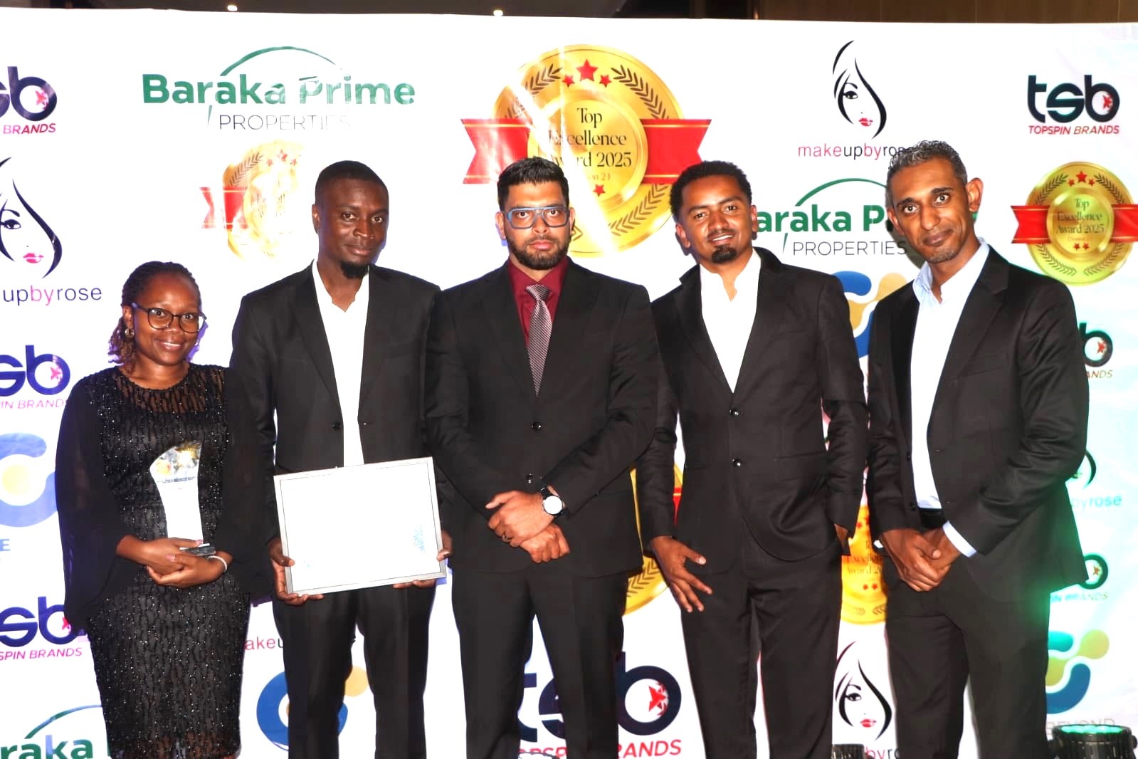 Pending bills blamed for cash crunch as business leaders urge Govt action 2 Precision Automotive CEO Imran Sokwala center with his team at the Topsin Brands awards in Nairobi on Monday. 1