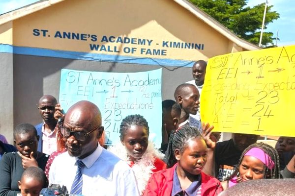 Principal St Annes Academy Kiminini Mr. Robert Masinde addressing the press at St Annes Academy Kiminini during celebrations after KJSEA results released