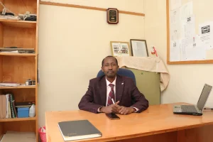 Rohi High School marks 20 years of academic excellence and transforming lives 2 Rohi High School Principla Mr. Daniel Muthua in his office