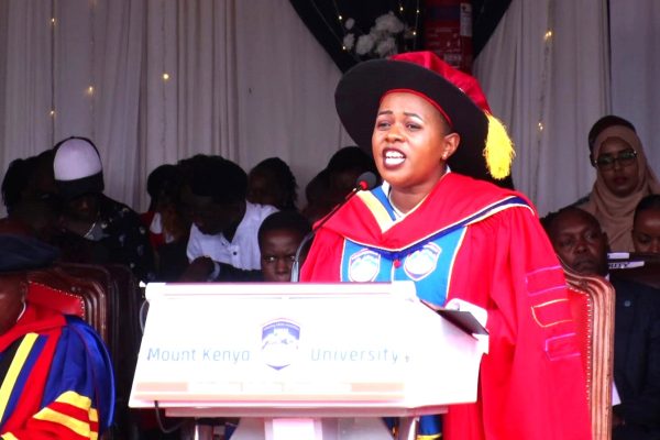The Principal Secretary State Department for Parliamentary Affairs office of the Prime Cabinet Secretary Dr Aurelia Rono speaking at MKUs 28th graduation ceremony in Thika