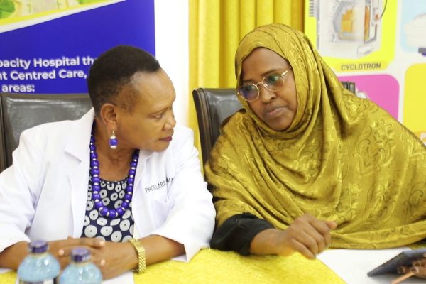 KUTRRH CEO Dr Zeinab Gura with KUs Prof Clara Momanyi during the induction of KU Health Sciences students at the hospital