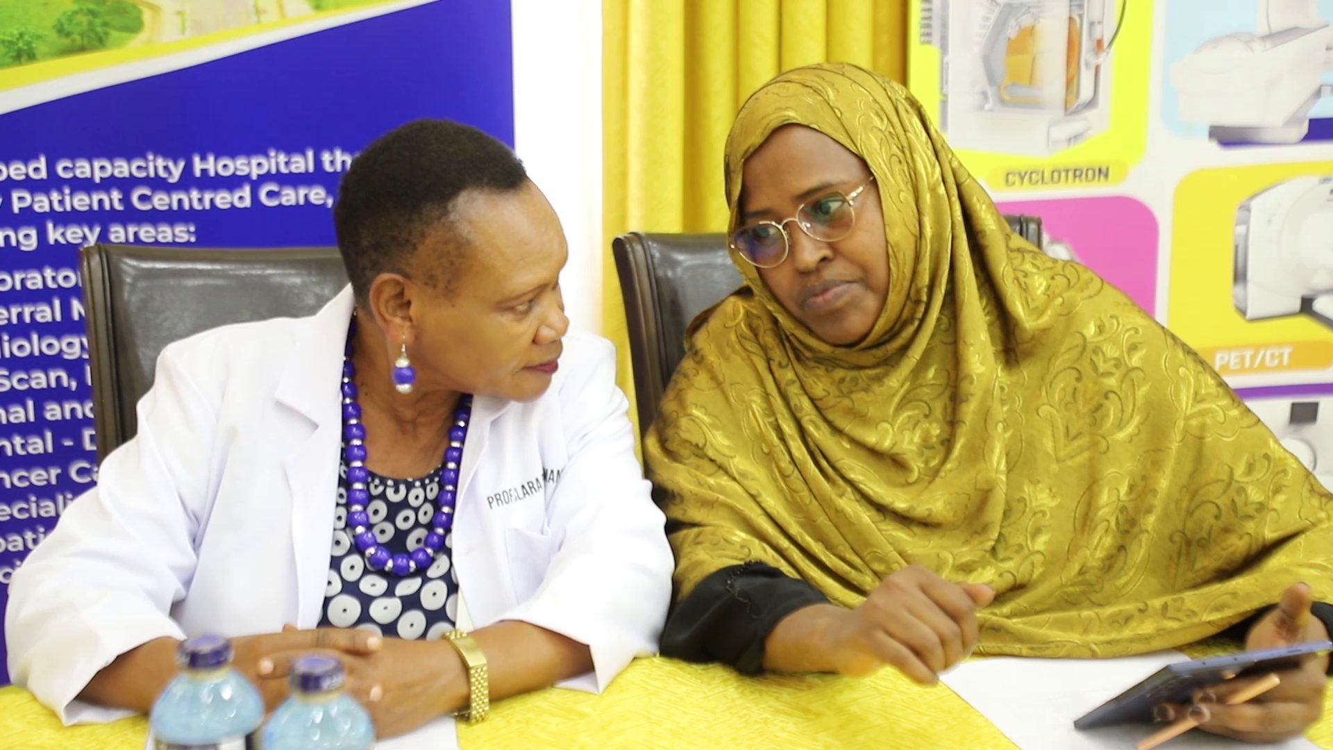 KUTRRH CEO Dr Zeinab Gura with KUs Prof Clara Momanyi during the induction of KU Health Sciences students at the hospital