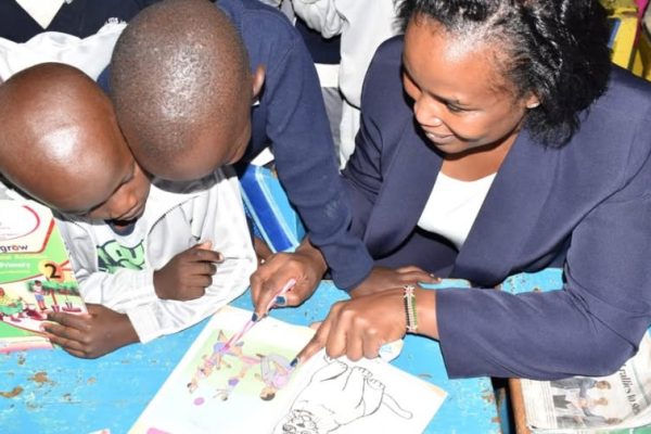 teacher engaging pupils in class