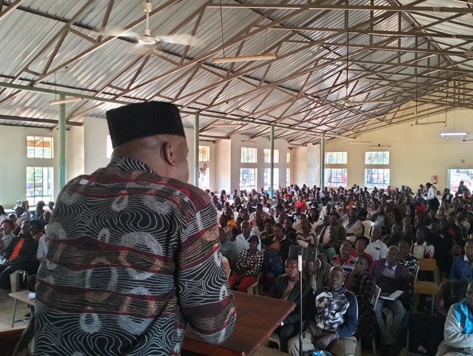 KNUT National second Vice Chairperson Aggrey Namisi addressing parents at Kitale school