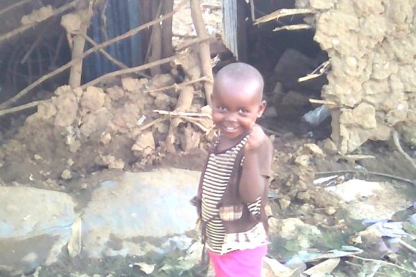A child from Mororo Township smiles refined