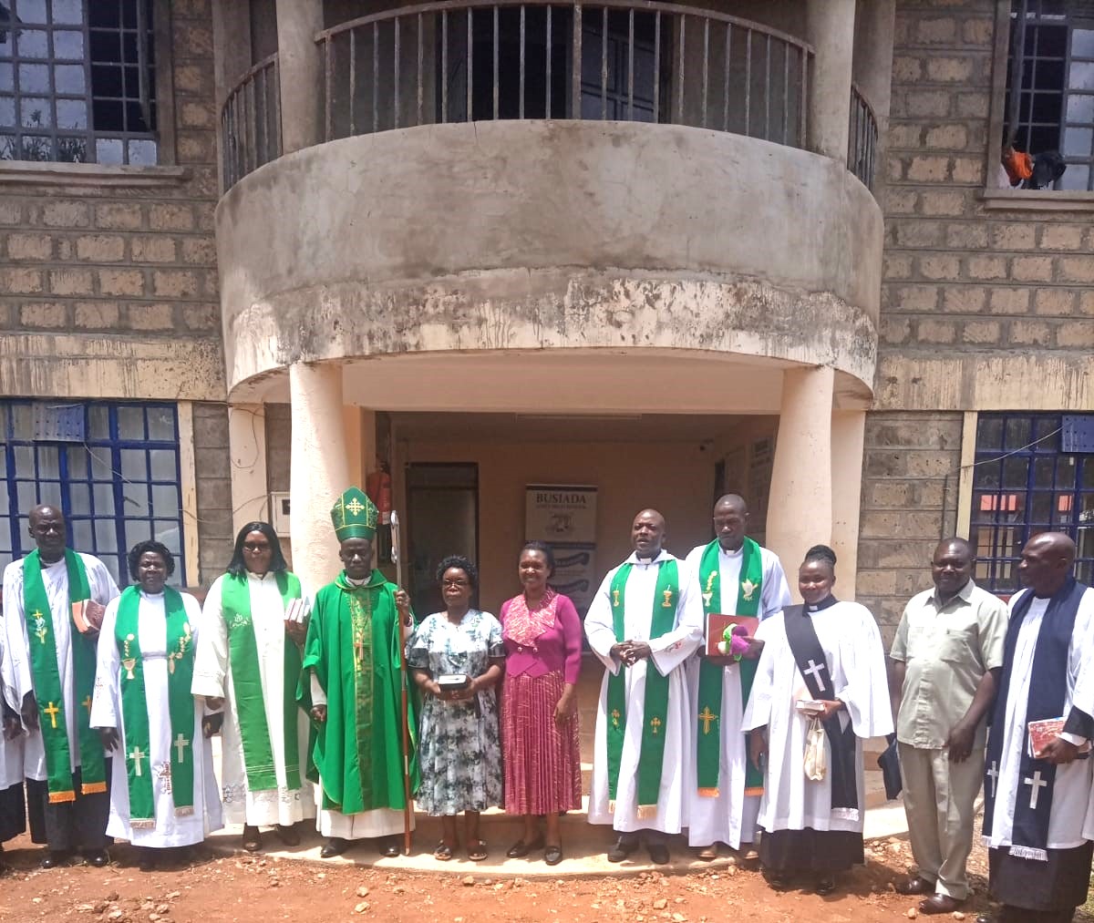 ACK Bishop Rt. Rev. Isaiah Obuya Mama Bishop Rev. Regina Obuya Busiada Girls Senior Principal Topister Khaseke and the school board members