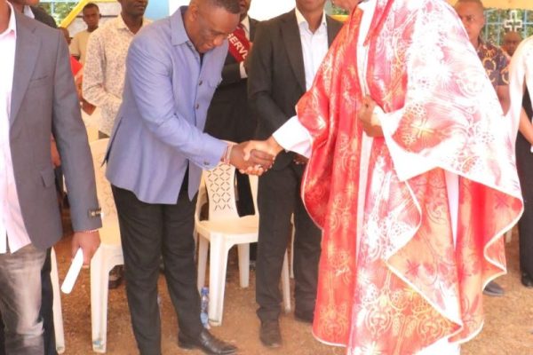 Catholic Diocese of Machakos Bishop Norman Kingoo greets Matungulu MP Stephen Mule during a Sunday service at Kinyui Catholic Church in Matungulu Constituency on Sunday February 8 2025 refined