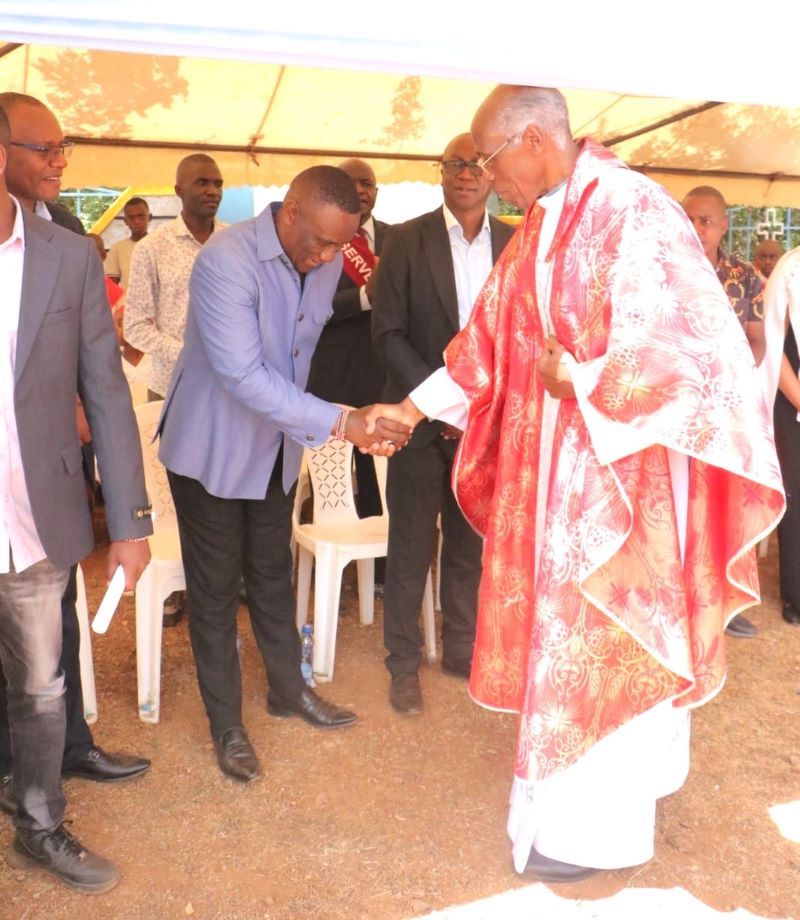 Catholic Diocese of Machakos Bishop Norman Kingoo greets Matungulu MP Stephen Mule during a Sunday service at Kinyui Catholic Church in Matungulu Constituency on Sunday February 8 2025 refined