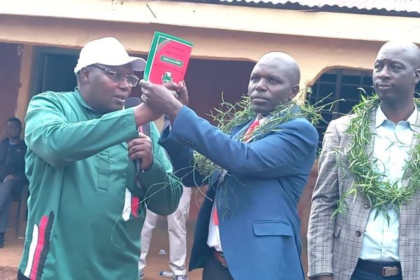 KNUT National Chairman Patrick Karinga left with newly elected KNUT Transmara Branch Chairman James Leparan centre and Executive Secretary Rodgers Limpaso