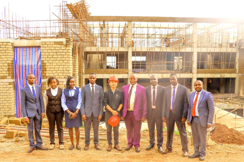 Prof. Winston Akala and student leaders tour new campus development at Koitaleel Samoei University College.