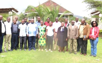 Prof. John Mosonik Chancellor of Rongo University with teachers and Board of Management members from Uswet and Kimawit schools during a sponsored retreat in Bomet County refined